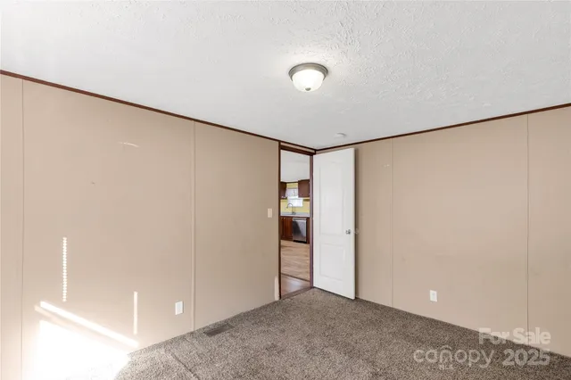 a aerial view of a house with a yard