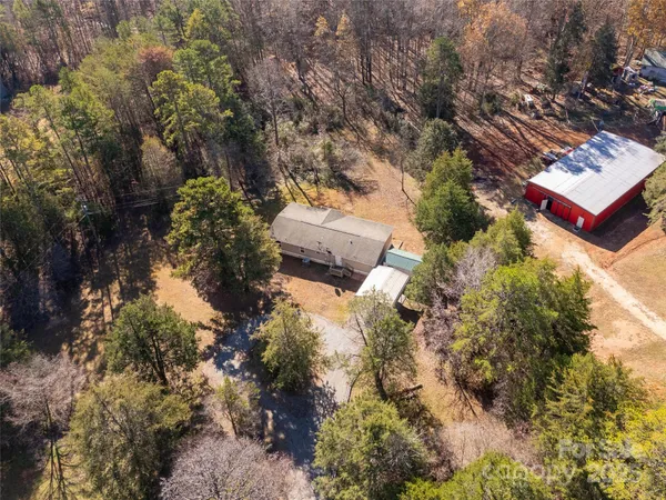 a aerial view of residential houses with outdoor space