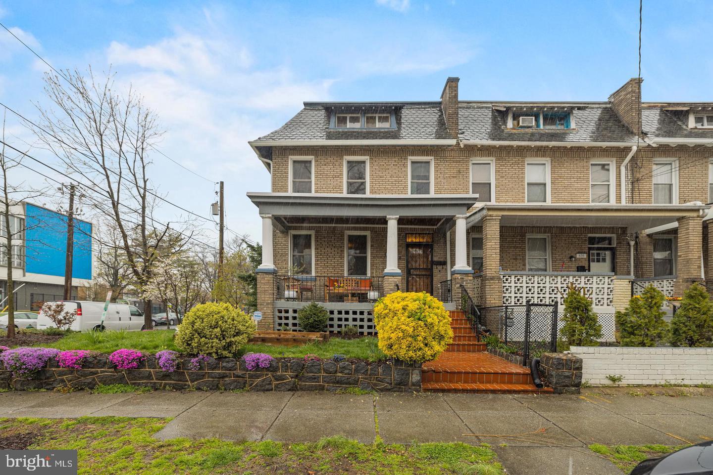a front view of building with an outdoor seating