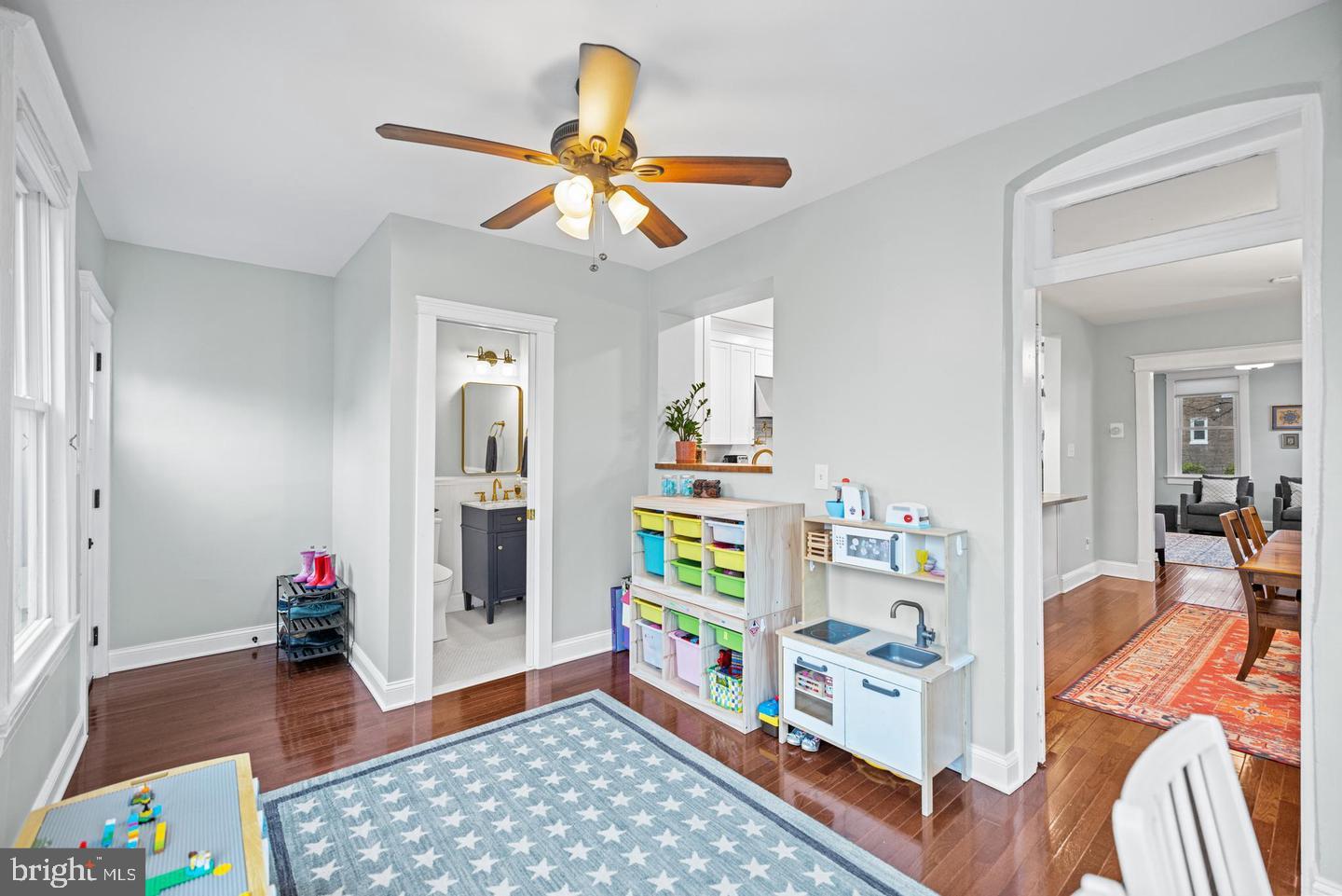 637 Allison Street Northwest Washington, DC 20011 - Photo 11 of 25 a living room with furniture and a window