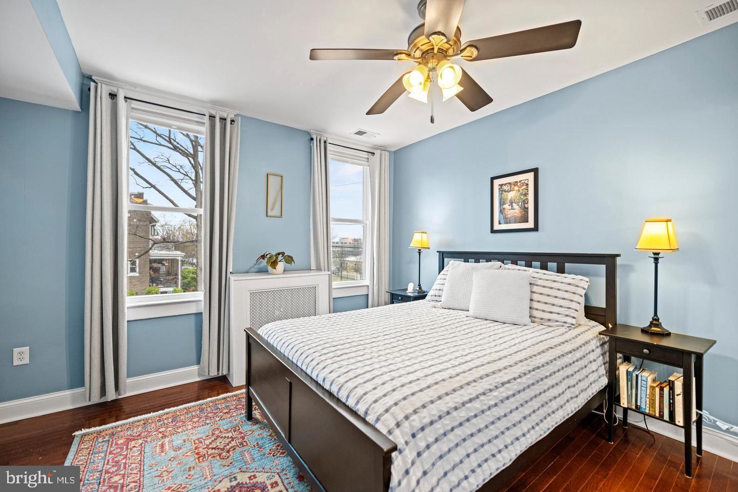 637 Allison Street Northwest Washington, DC 20011 - Photo 12 of 25 a bedroom with a bed and a window