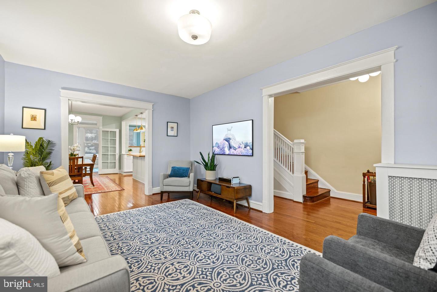 637 Allison Street Northwest Washington, DC 20011 - Photo 2 of 25 a living room with furniture and a wooden floor