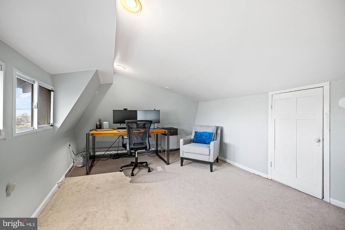 637 Allison Street Northwest Washington, DC 20011 - Photo 21 of 25 a reading room with furniture and white walls