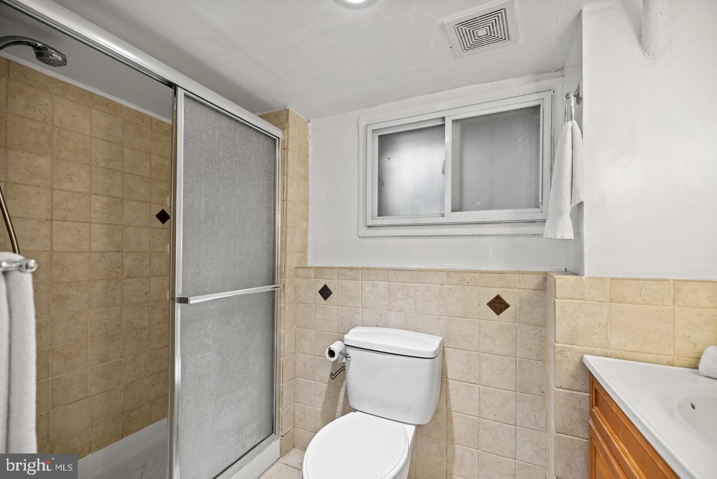 637 Allison Street Northwest Washington, DC 20011 - Photo 23 of 25 a bathroom with a toilet and a shower