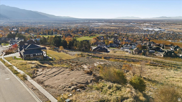 1211 West Fallow Way Ogden, UT 84414 - Photo 8 of 20 Aerial view of property and surrounding area featuring nearby suburban area and a mountain backdrop