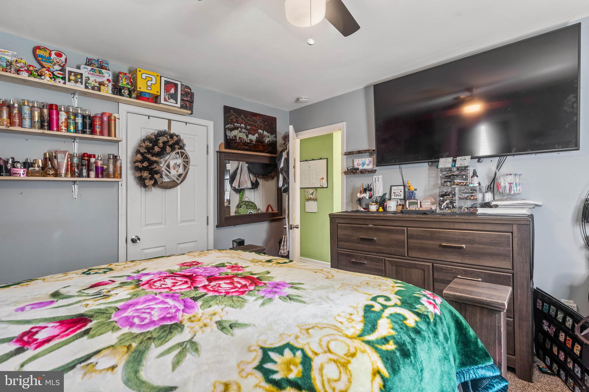 32197 Johnson Road Salisbury, MD 21804 - Photo 11 of 23 a bedroom with a bed and a flat screen tv