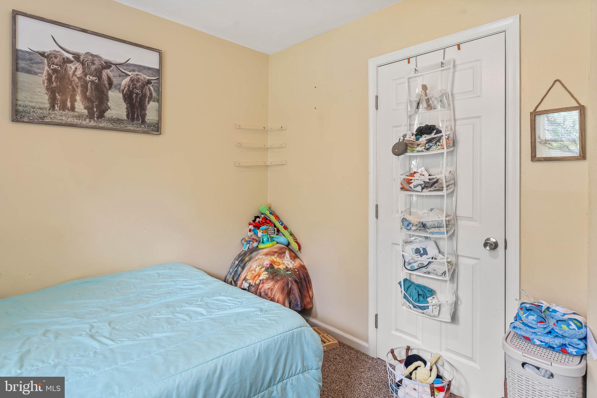 32197 Johnson Road Salisbury, MD 21804 - Photo 15 of 23 a bedroom with a bed and a window