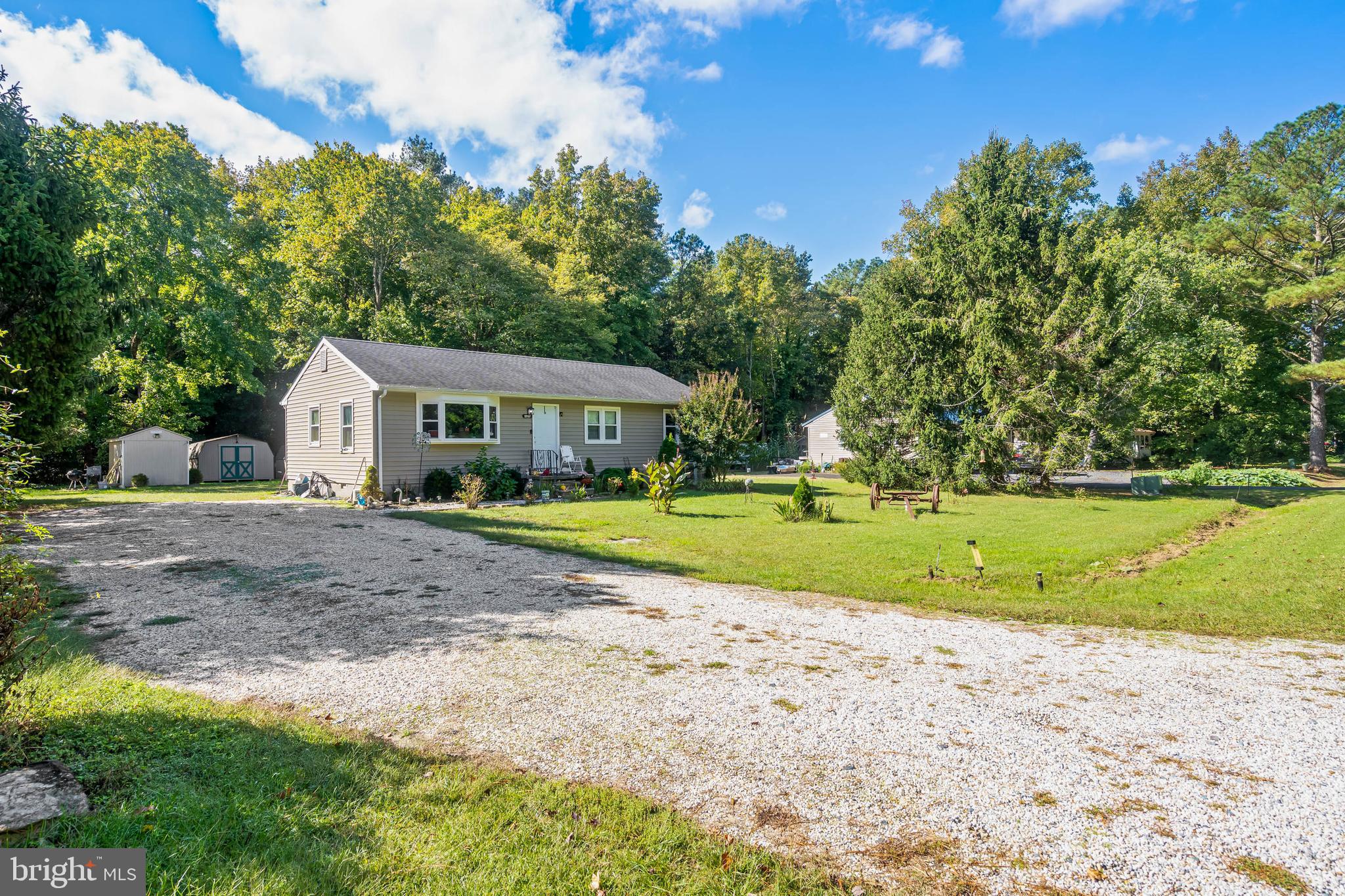 32197 Johnson Road Salisbury, MD 21804 - Photo 18 of 23 a view of house with garden and trees