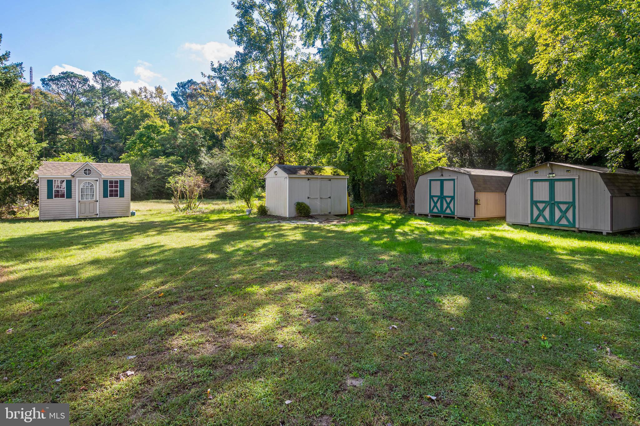 32197 Johnson Road Salisbury, MD 21804 - Photo 23 of 23 a view of a house with a big yard