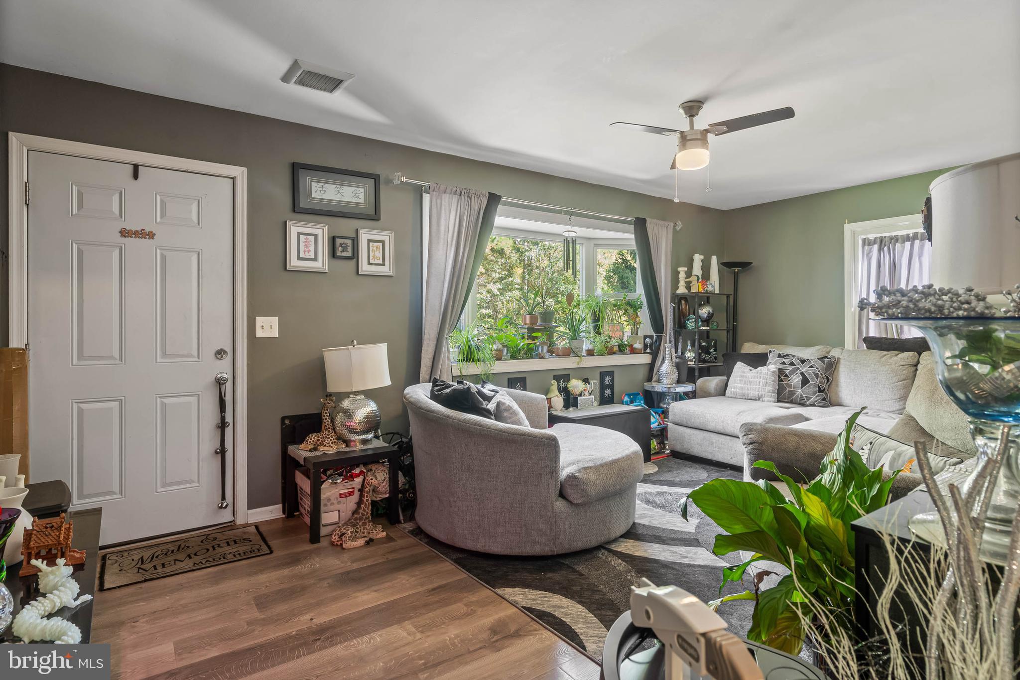 32197 Johnson Road Salisbury, MD 21804 - Photo 3 of 23 a living room with furniture and a large window