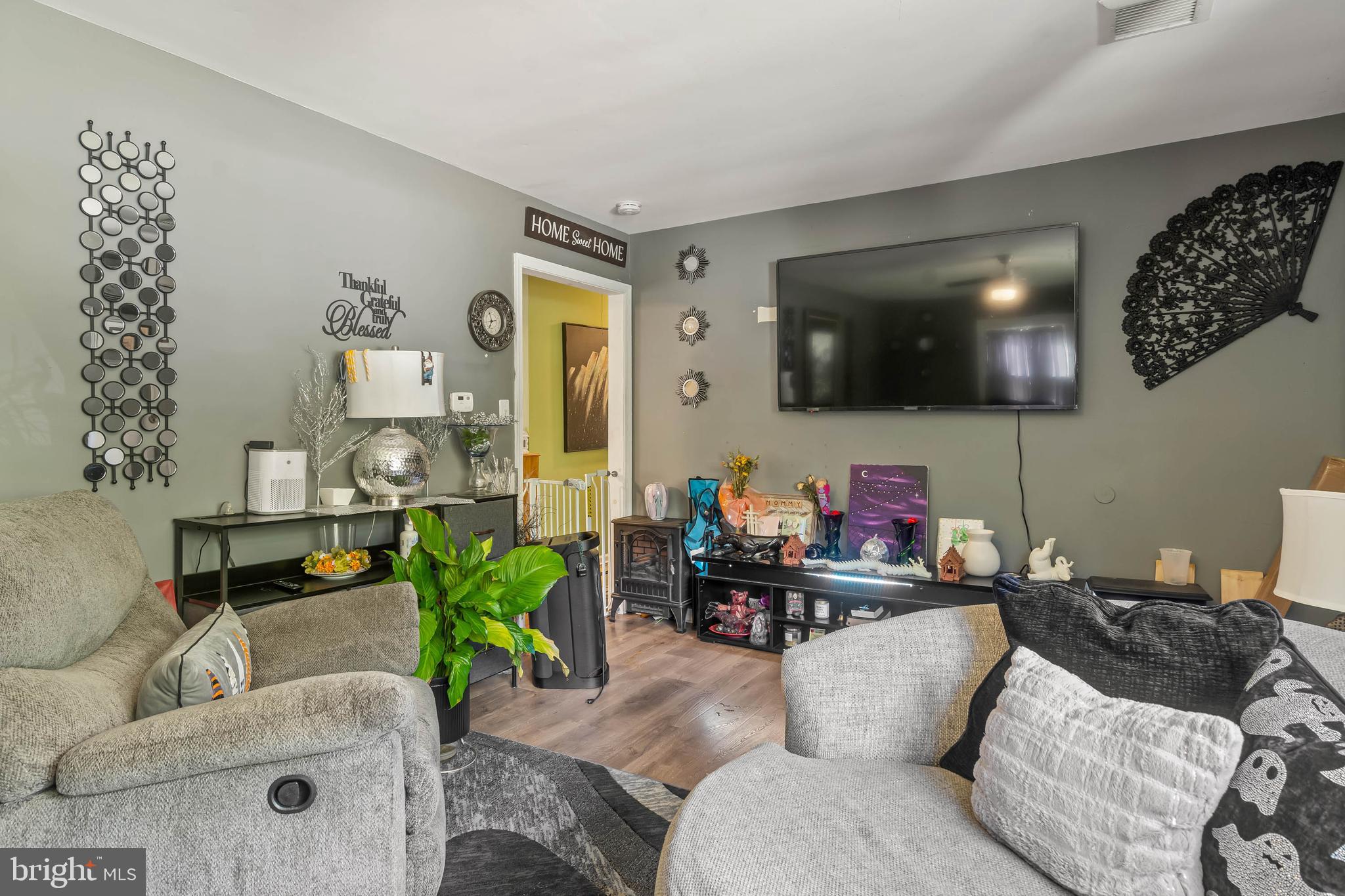 32197 Johnson Road Salisbury, MD 21804 - Photo 5 of 23 a living room with furniture and a flat screen tv