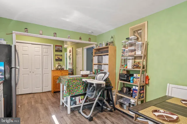 a room with furniture and a book shelf