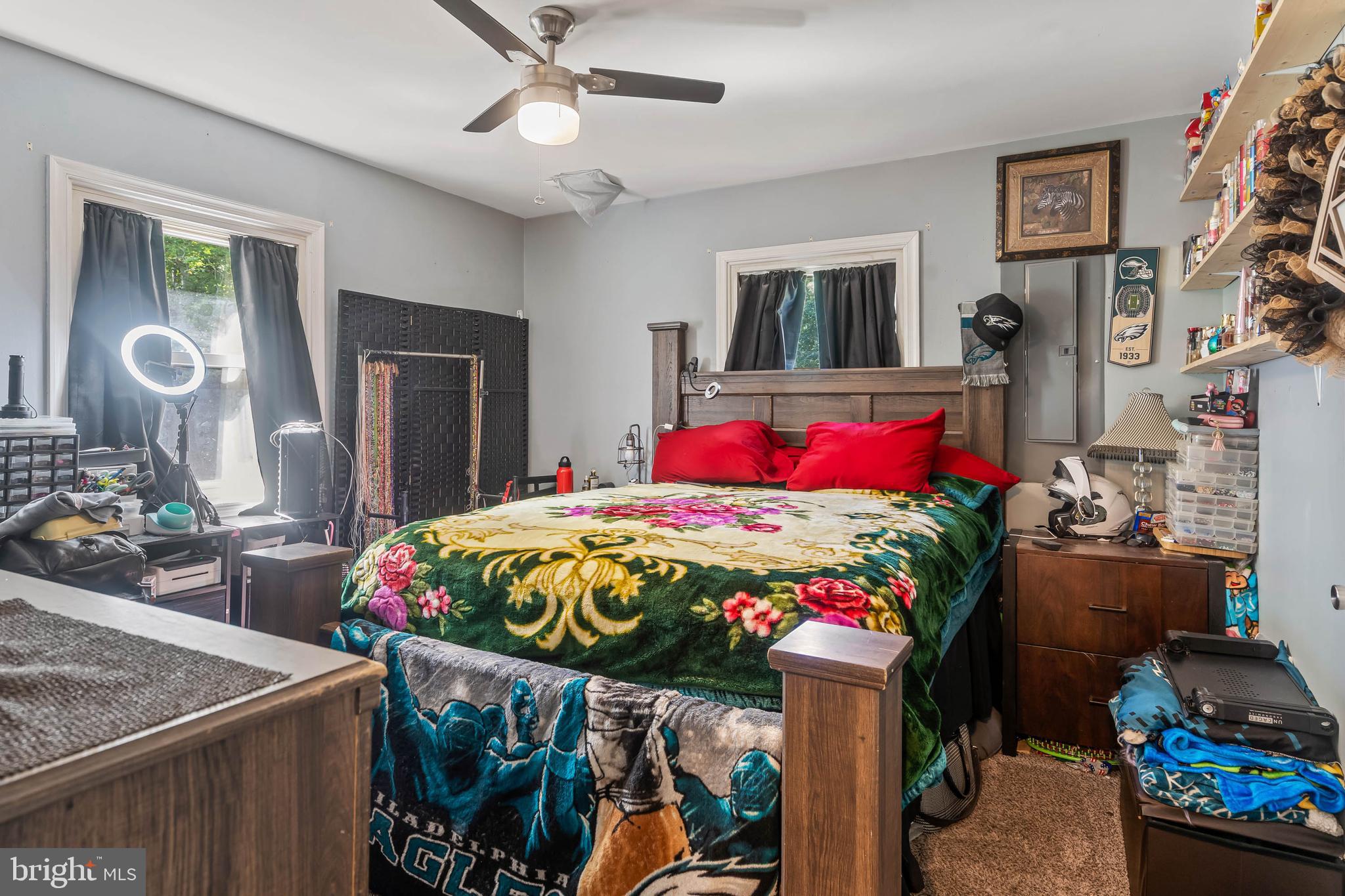 32197 Johnson Road Salisbury, MD 21804 - Photo 10 of 23 a bedroom with a bed and a dresser