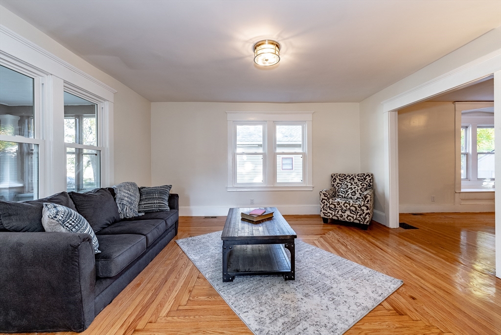 165 Laurelton Street Springfield, MA 01109 - Photo 13 of 31 a living room with furniture and a window
