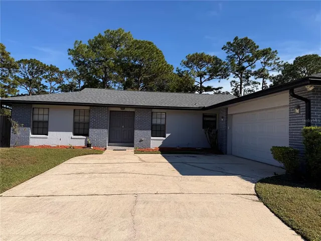 a house view with a garden space