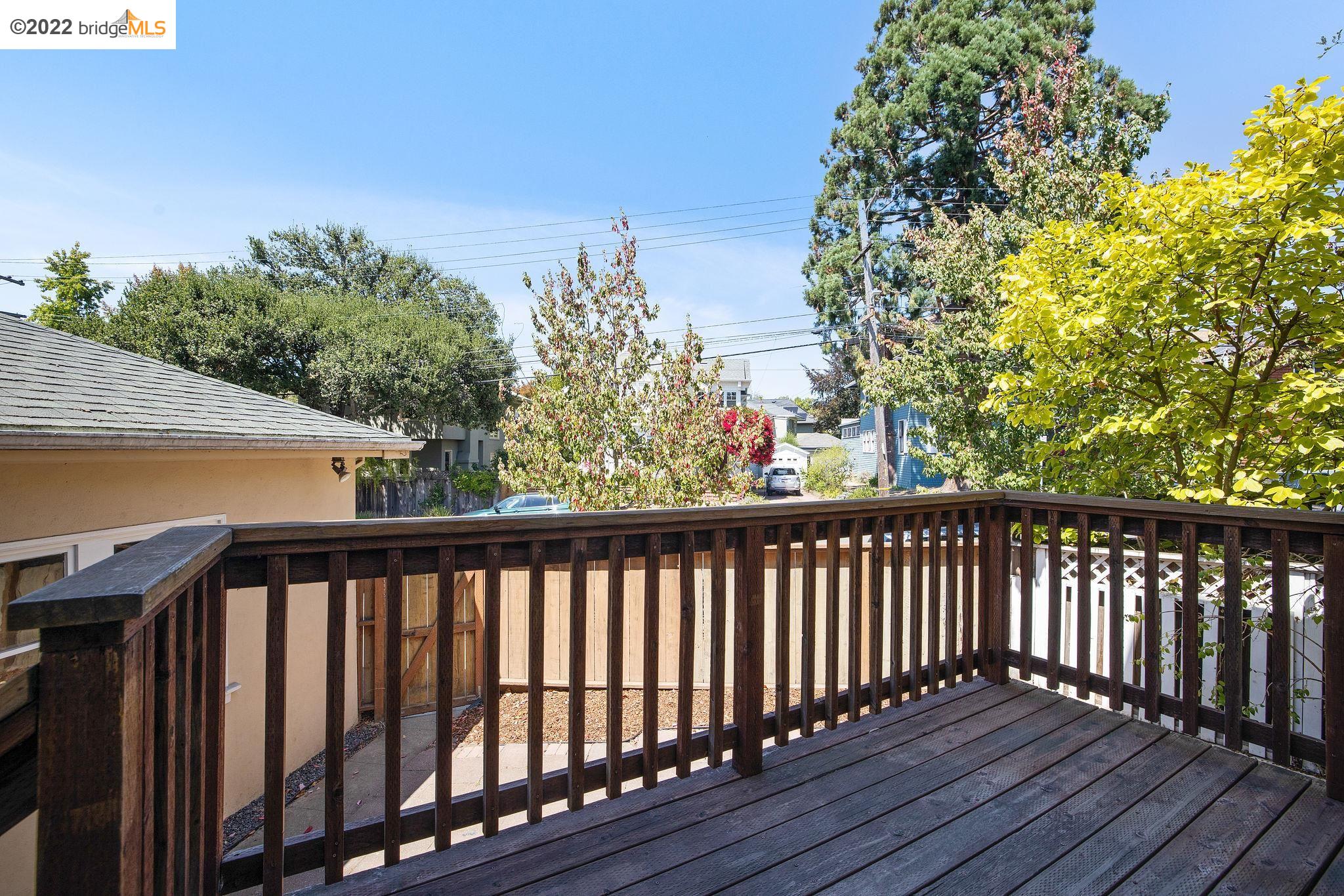 Undisclosed Address Berkeley, CA 94705 - Photo 23 of 28 a balcony with wooden floor and fence