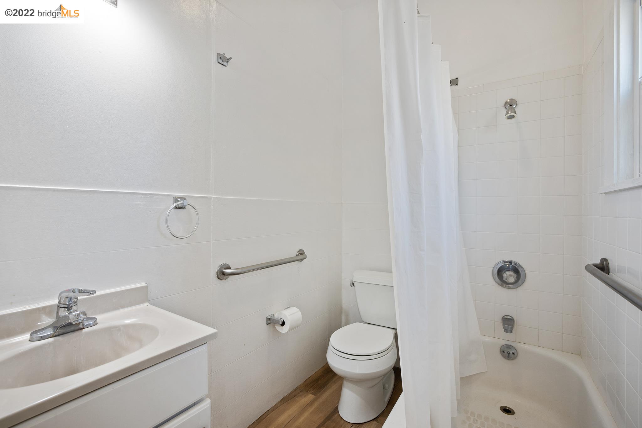 Undisclosed Address Berkeley, CA 94705 - Photo 10 of 28 a bathroom with a sink toilet and shower