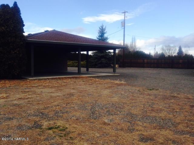 806 Estes Road Yakima, WA 98908 - Photo 11 of 12 a view of a house with a backyard