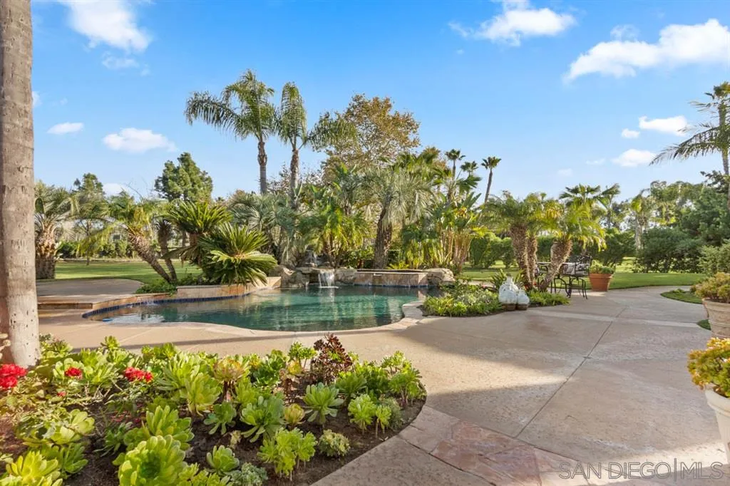 15611 Via De Santa Fe Rancho Santa Fe, CA 92067 - Photo 20 of 25 a view of a garden with a lake