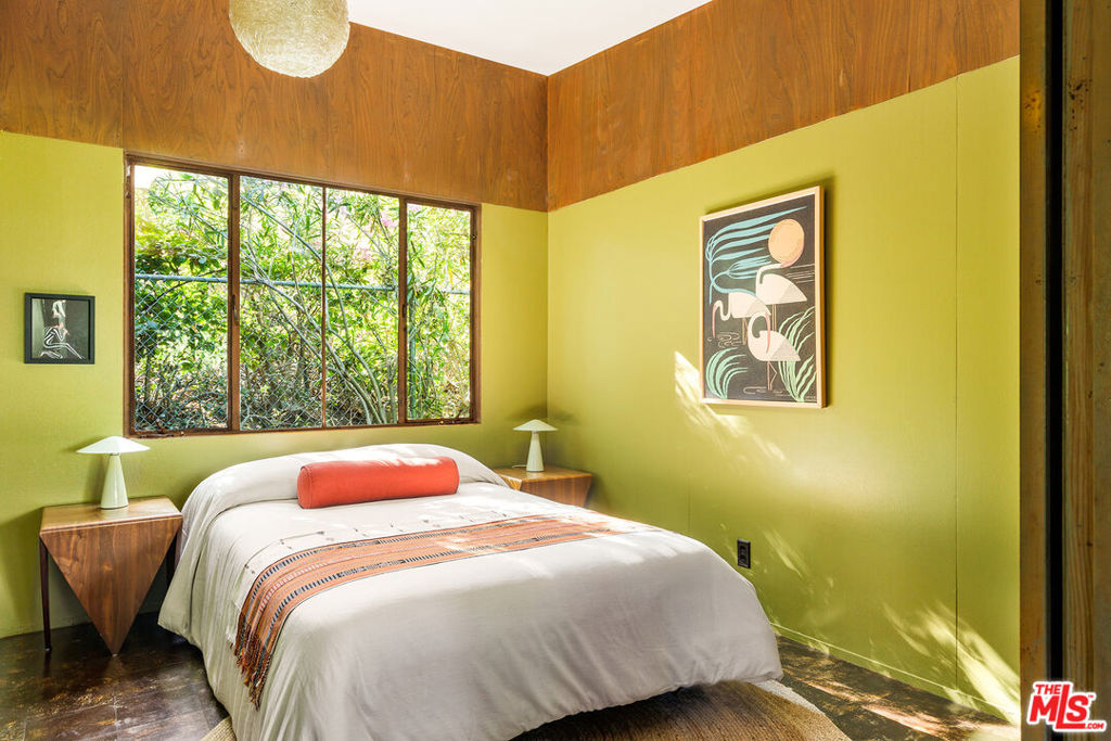 1475 Scenic Drive Pasadena, CA 91103 - Photo 22 of 38 a bedroom with a bed and wooden floor