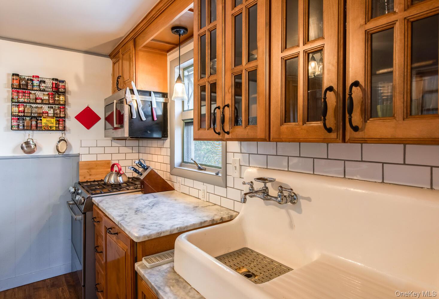 21 Prospect Street Brewster, NY 10509 - Photo 19 of 47 a bathroom with a sink and a mirror