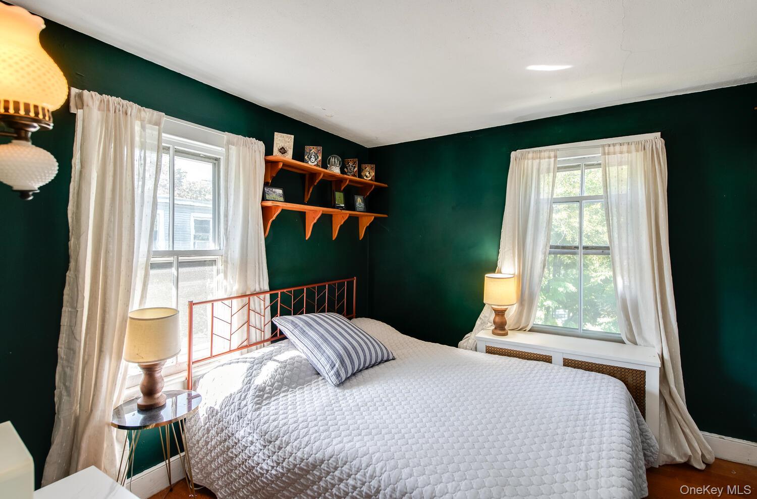 21 Prospect Street Brewster, NY 10509 - Photo 24 of 47 a bedroom with a bed and a window