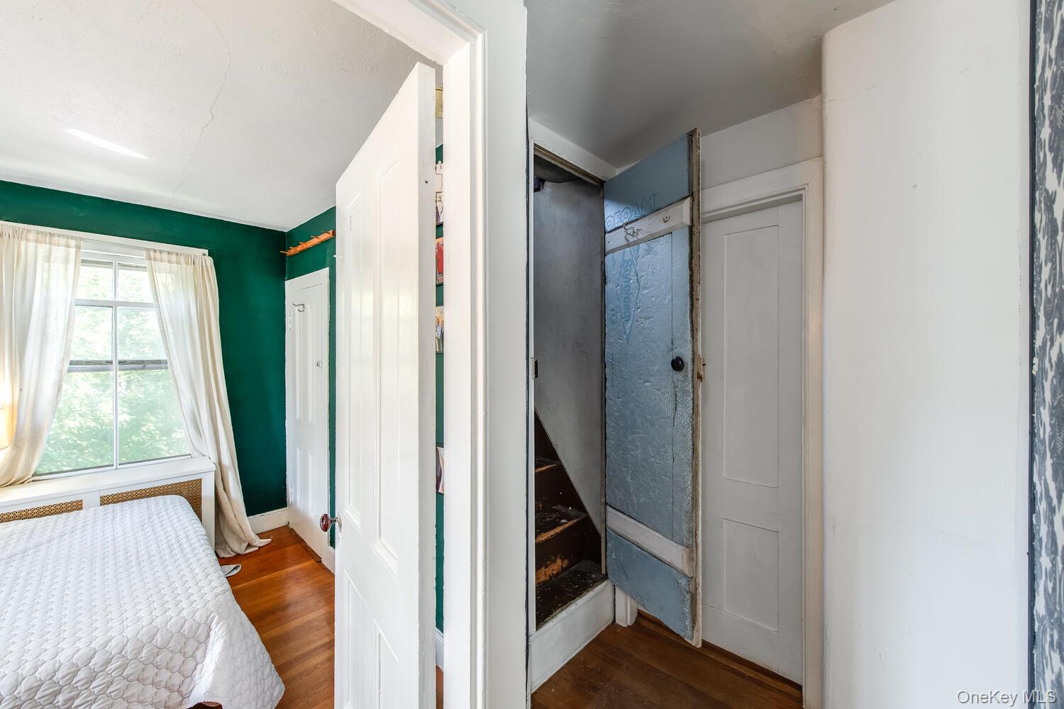21 Prospect Street Brewster, NY 10509 - Photo 32 of 47 a view of a hallway with wooden floor and stairs