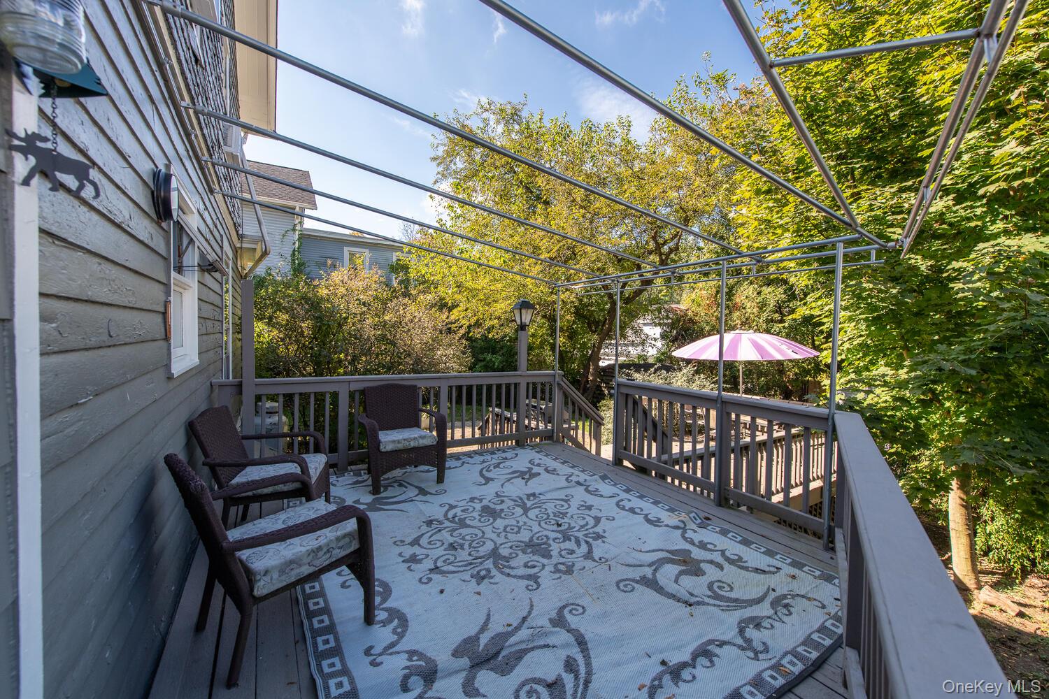 21 Prospect Street Brewster, NY 10509 - Photo 36 of 47 a view of a chairs and tables in the balcony