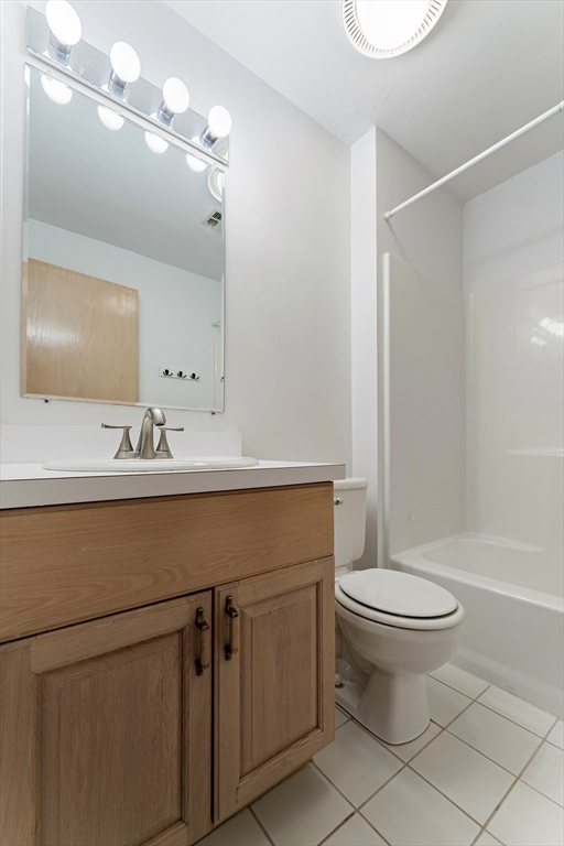 22 Arrowhead Circle, Unit 22 Ashland, MA 01721 - Photo 27 of 35 a bathroom with a sink toilet and shower
