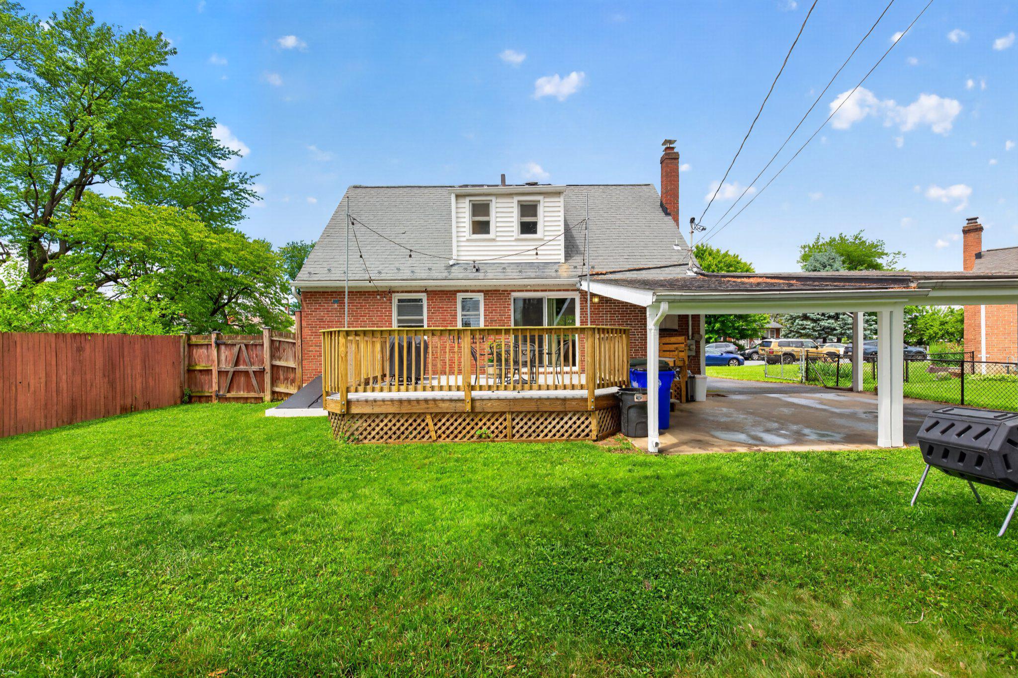 1002 Wilson Place Frederick, MD 21702 - Photo 29 of 30 a view of a house with a yard and sitting area