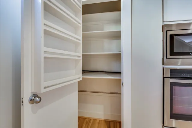 a empty refrigerator with a stove