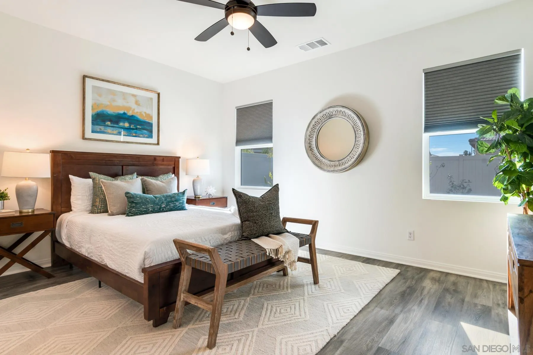 1484 Wicklow Avenue Redlands, CA 92374 - Photo 12 of 35 a bedroom with a bed and a chair