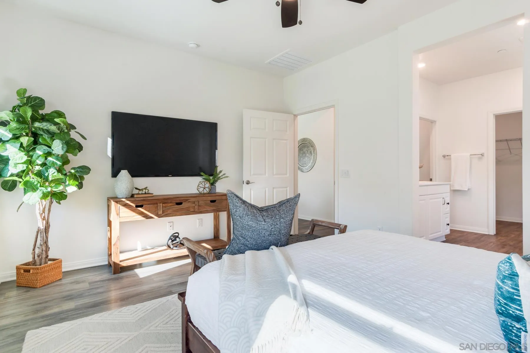 1484 Wicklow Avenue Redlands, CA 92374 - Photo 13 of 35 a bedroom with a bed and a flat screen tv