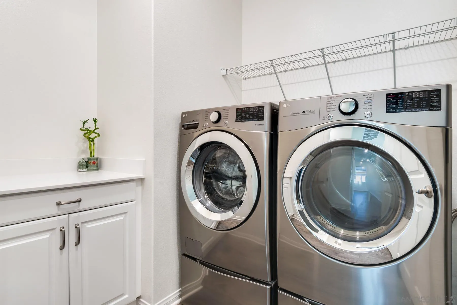 1484 Wicklow Avenue Redlands, CA 92374 - Photo 17 of 35 a utility room with dryer and washer
