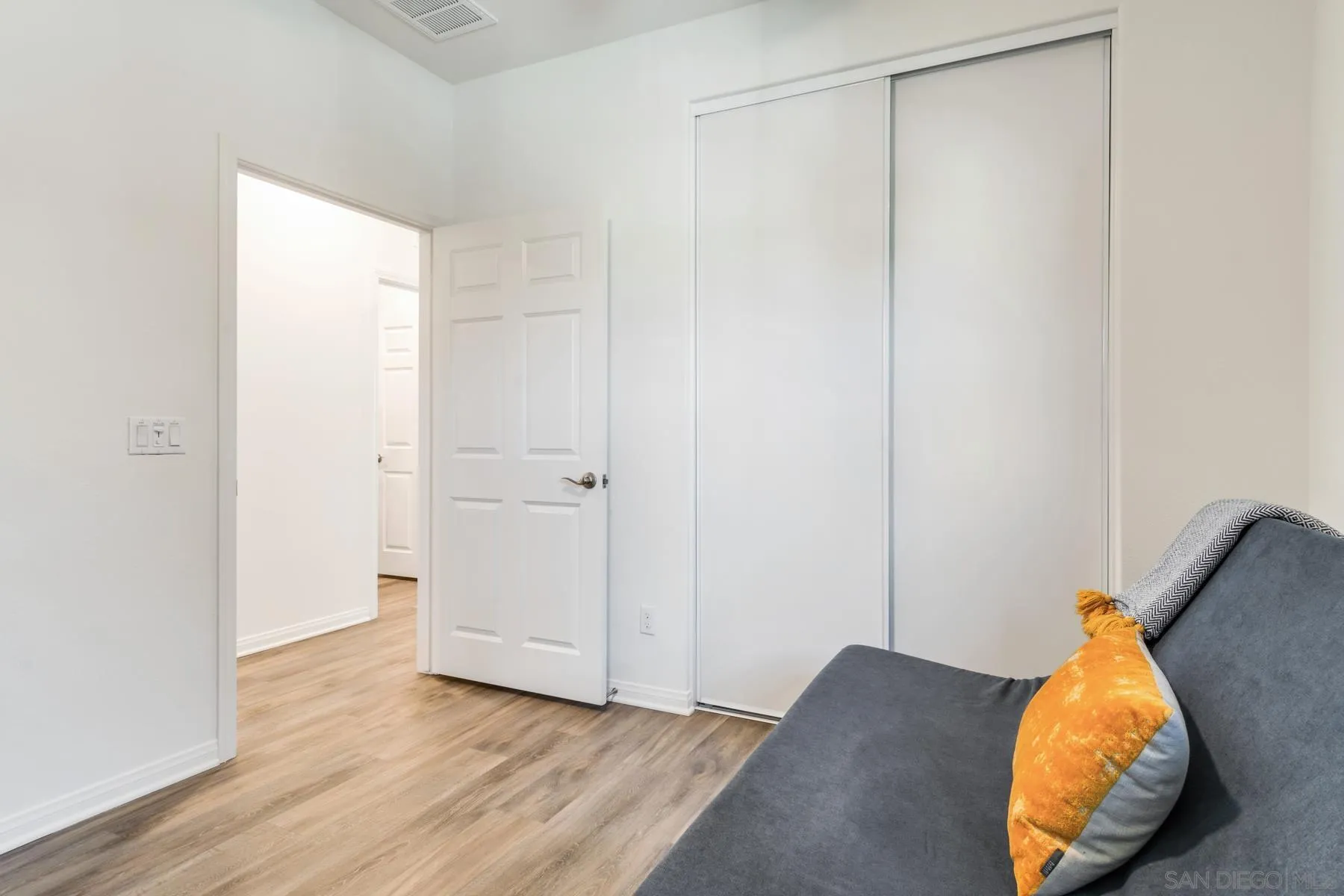 1484 Wicklow Avenue Redlands, CA 92374 - Photo 19 of 35 a view of a bedroom with wooden floor