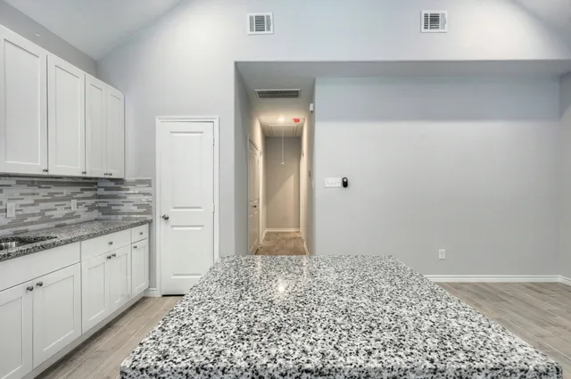 a big room with wooden floor