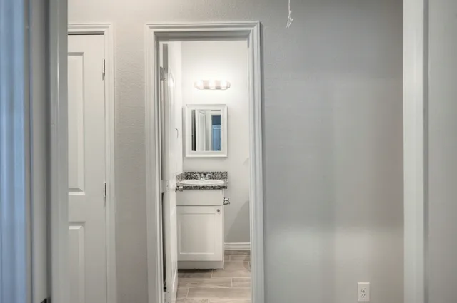 a bathroom with a toilet sink