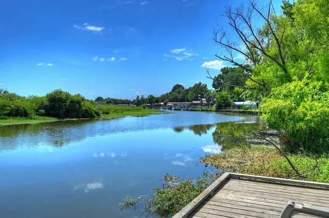 a view of outdoor space with deck and yard