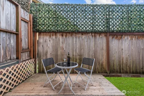 a view of outdoor space with a wooden furniture