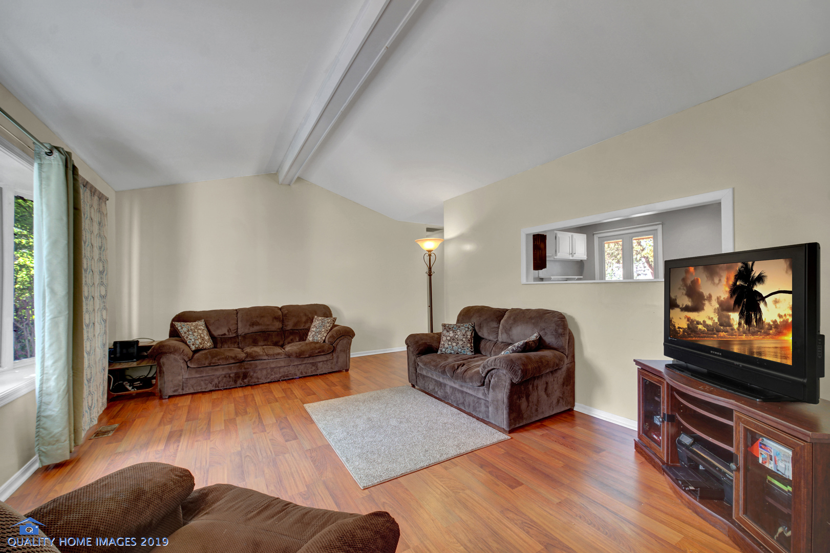 27W241 Churchill Road Winfield, IL 60190 - Photo 11 of 24 a living room with furniture and a flat screen tv