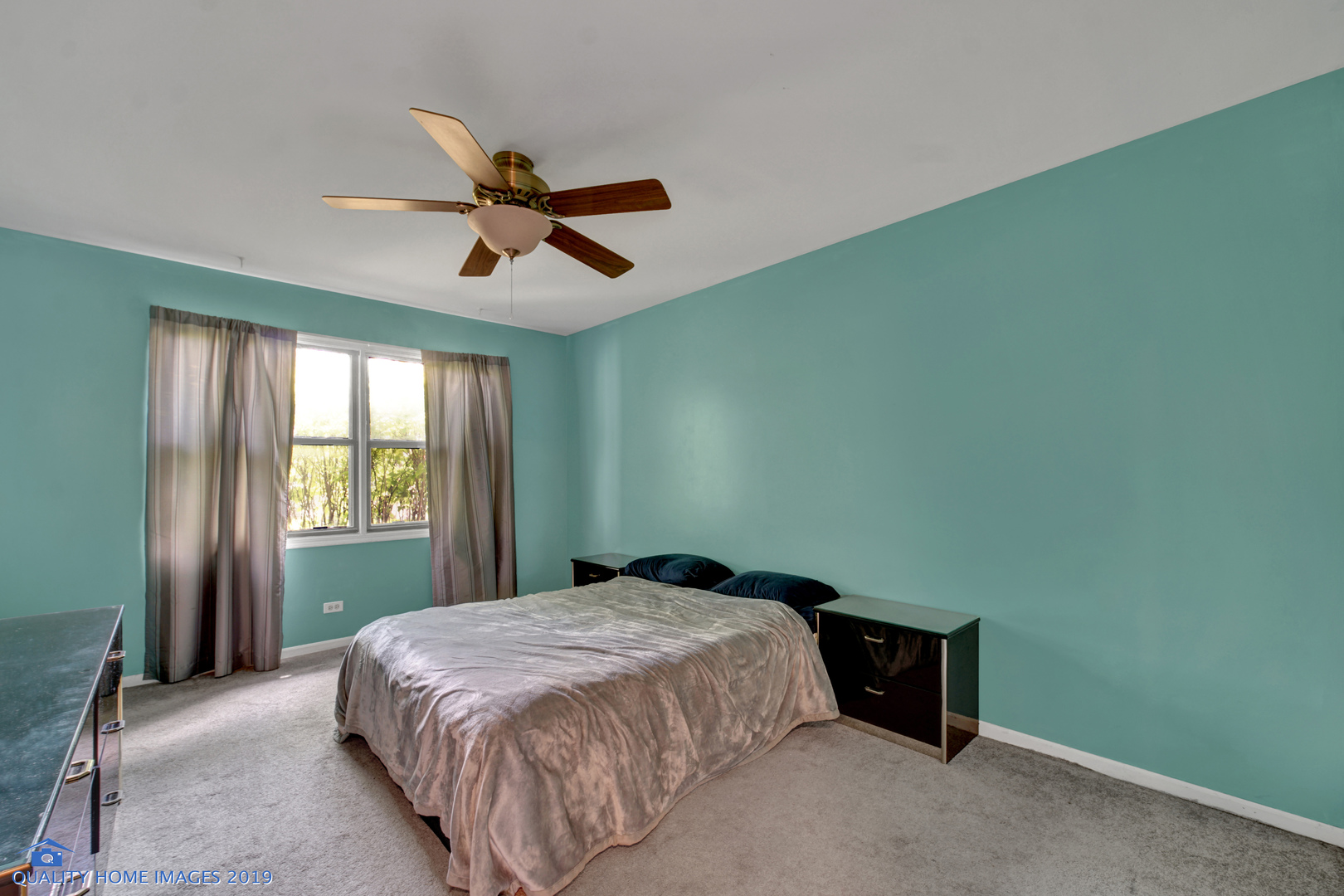 27W241 Churchill Road Winfield, IL 60190 - Photo 13 of 24 a bedroom with a bed and a window