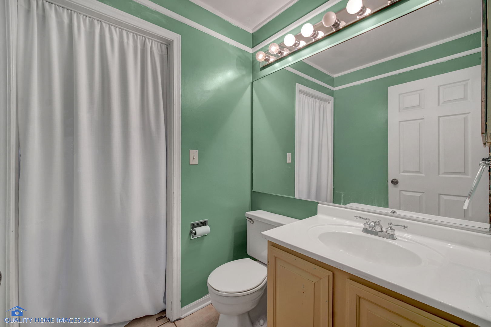 27W241 Churchill Road Winfield, IL 60190 - Photo 16 of 24 a bathroom with a sink a toilet a mirror and shower