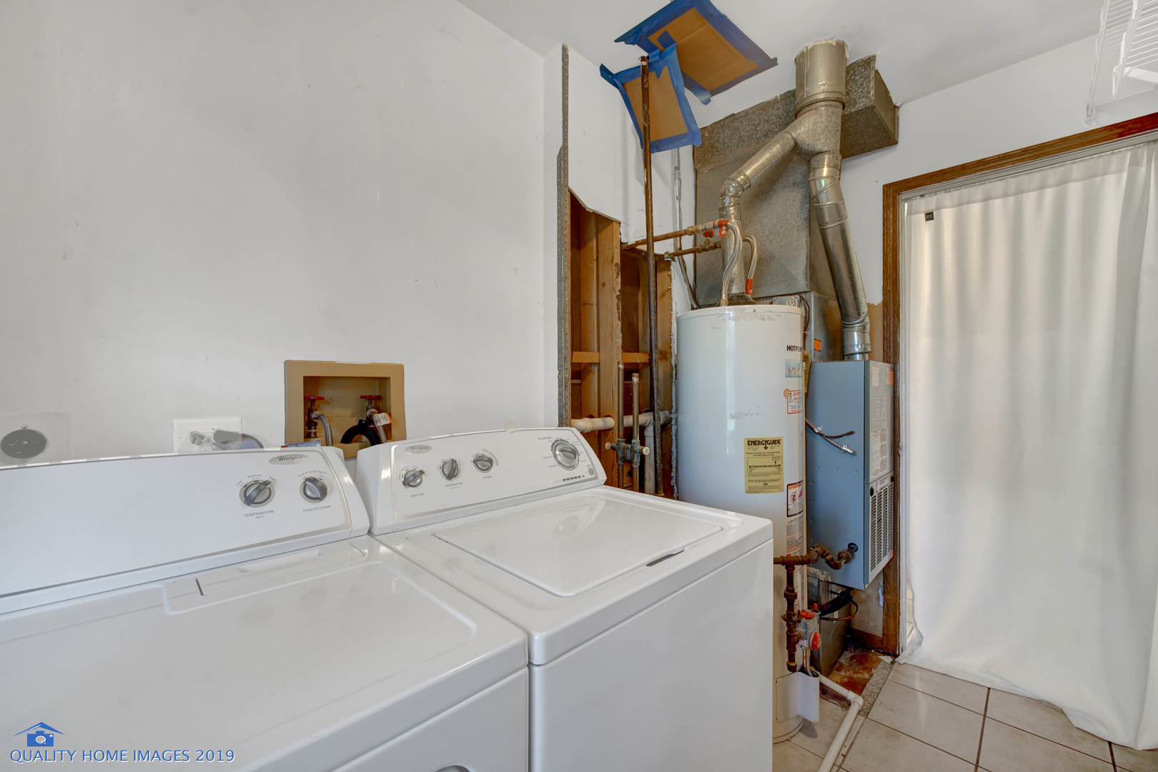 27W241 Churchill Road Winfield, IL 60190 - Photo 18 of 24 a utility room with dryer and washer