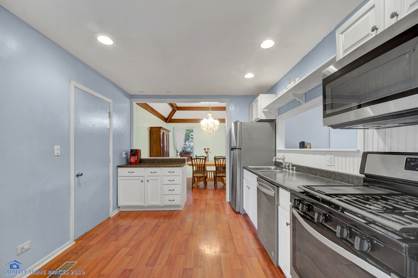 27W241 Churchill Road Winfield, IL 60190 - Photo 5 of 24 a kitchen with stainless steel appliances granite countertop a stove and a sink