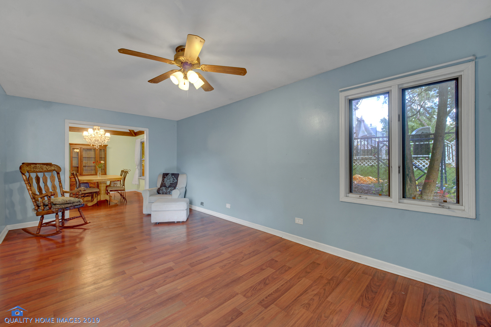 27W241 Churchill Road Winfield, IL 60190 - Photo 9 of 24 a view of a livingroom with furniture and a window