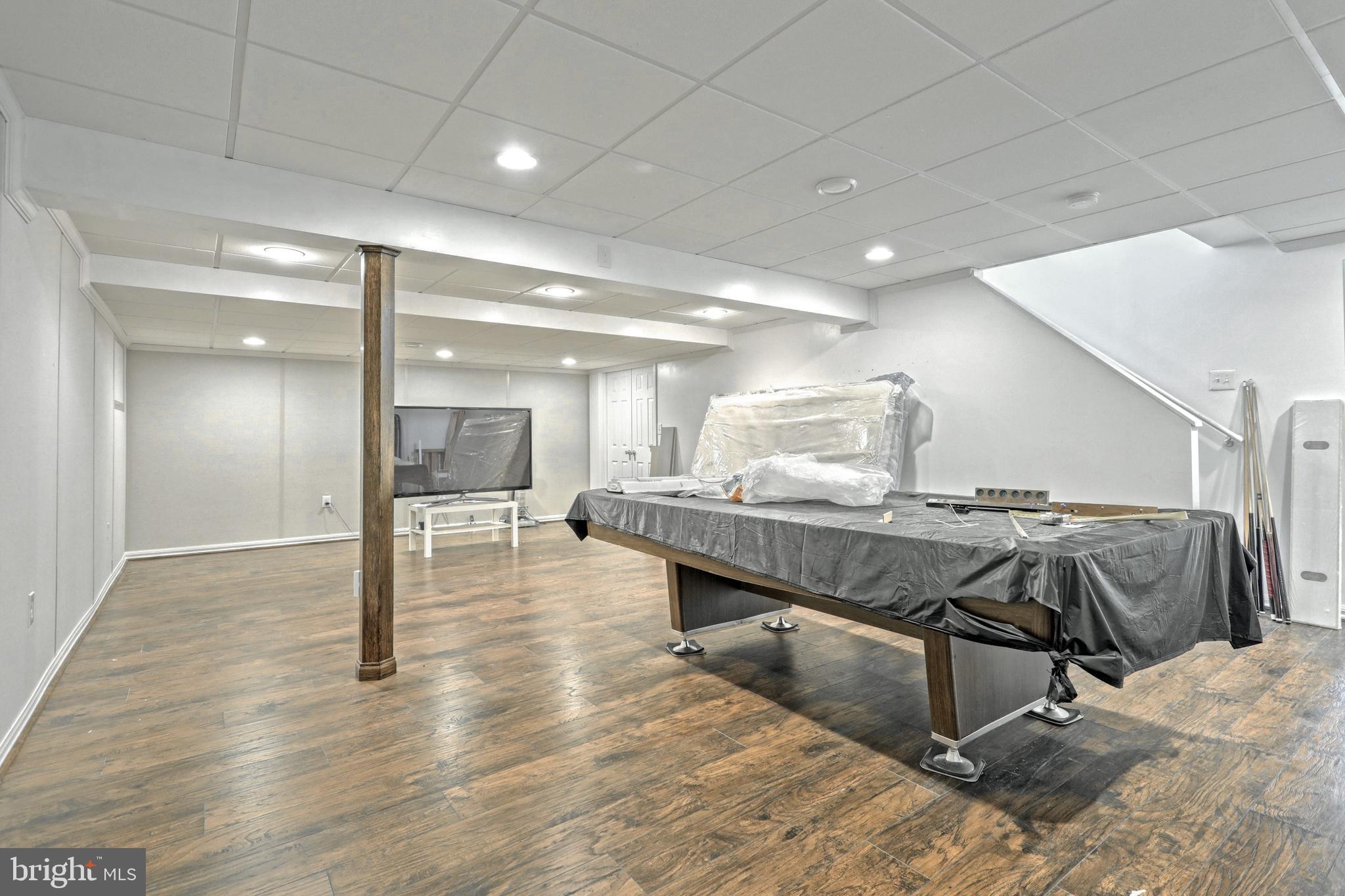 34 Alexander Drive Hanover, PA 17331 - Photo 44 of 53 Finished family room in basement with laminate fl