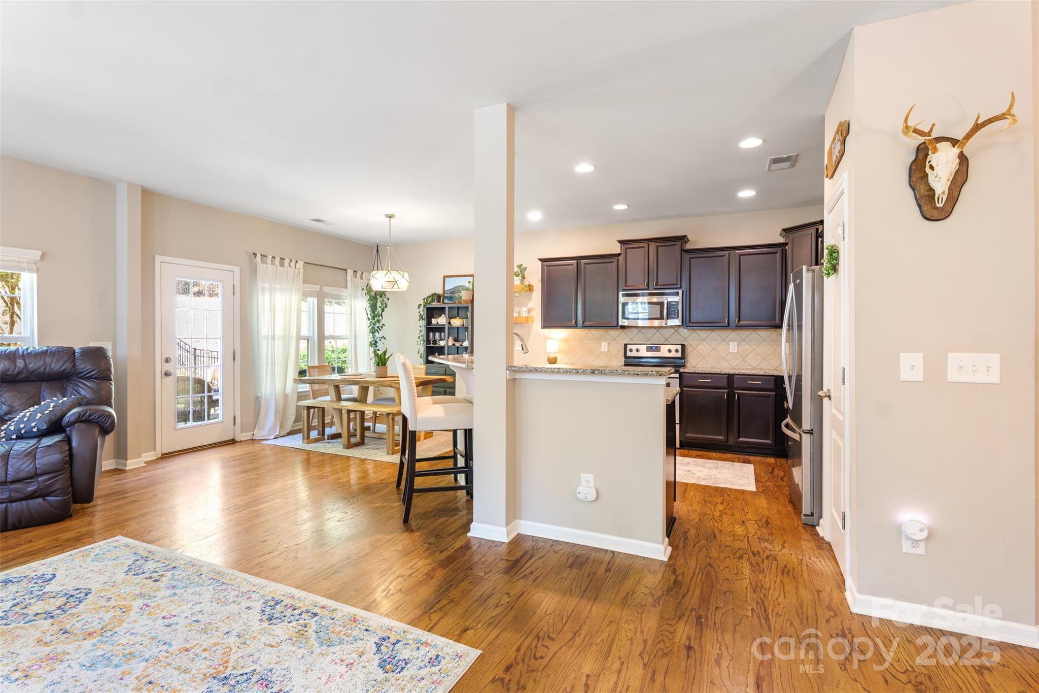 78090 Rillstone Drive Lancaster, SC 29720 - Photo 8 of 36 a view of kitchen with furniture and wooden floor