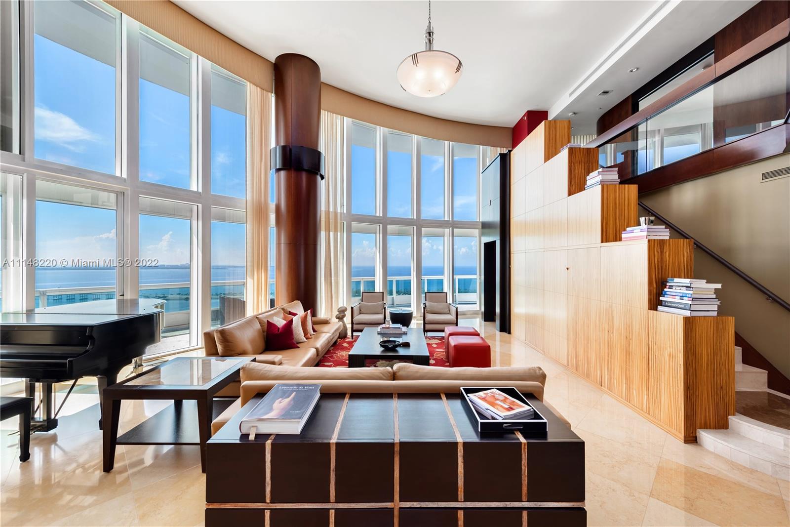 1643 Brickell Avenue, Unit 3702 Miami, FL 33129 - Photo 4 of 15 a room with furniture and large windows