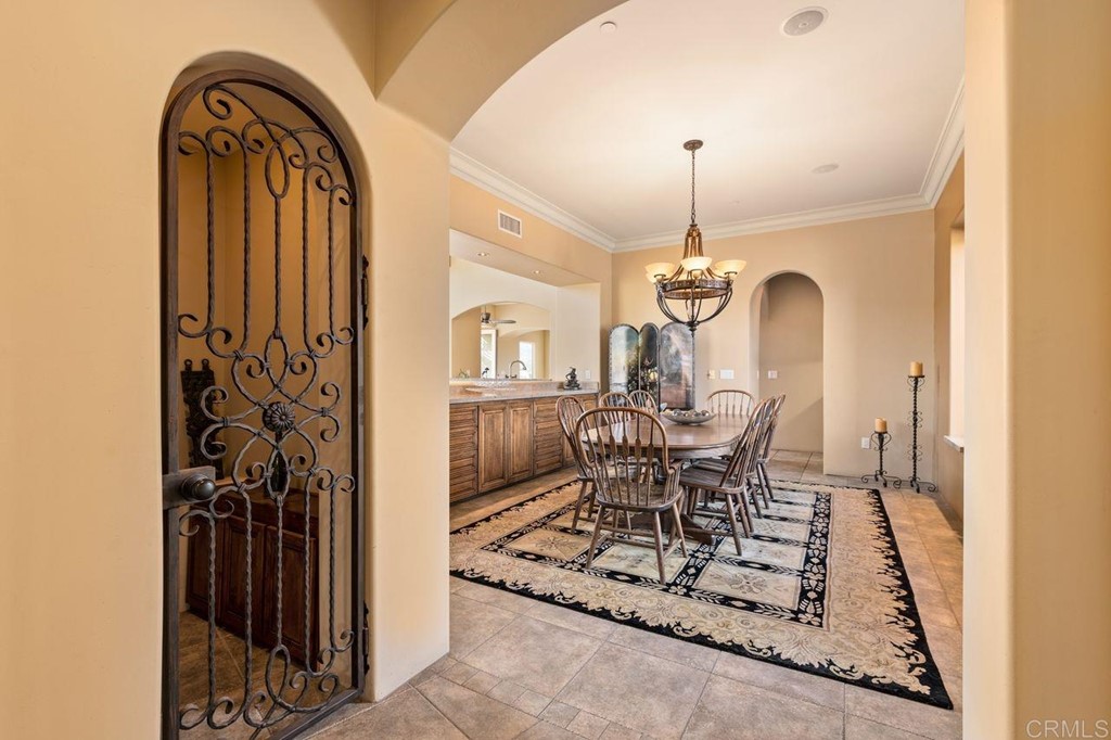 10363 Hidden Meadows Road Escondido, CA 92026 - Photo 16 of 65 a dining room with furniture window and entryway