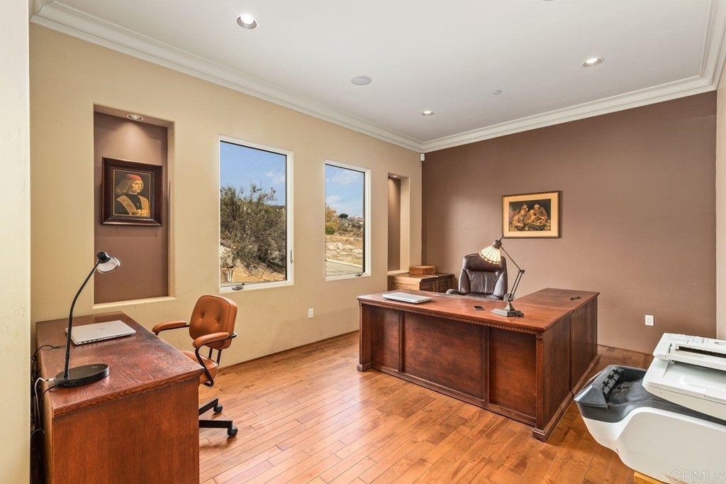 10363 Hidden Meadows Road Escondido, CA 92026 - Photo 25 of 65 a view of a workspace with furniture and a window